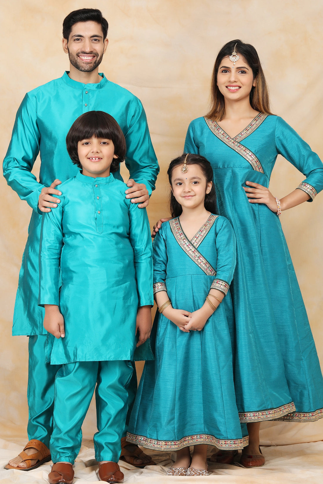 Exquisite Peacock Blue Ethnic Silk Gown with Matching Kurta Pyjama Family Matching Set