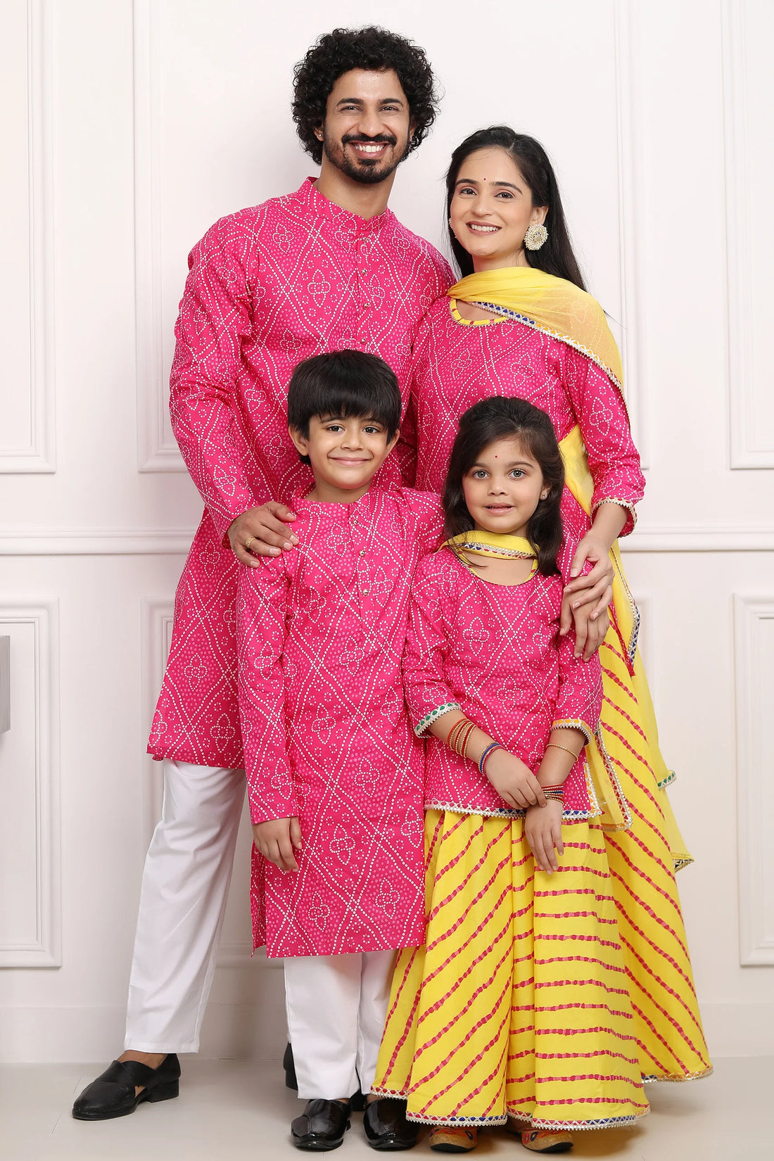 Fuchsia Jaipuri Kurta and Yellow Bandhani Lehenga With Matching Kurta Payjama Family Set
