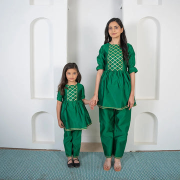 Refreshing Green and Golden Peplum Kurta with Pants For Mom and Daughter Twin Set