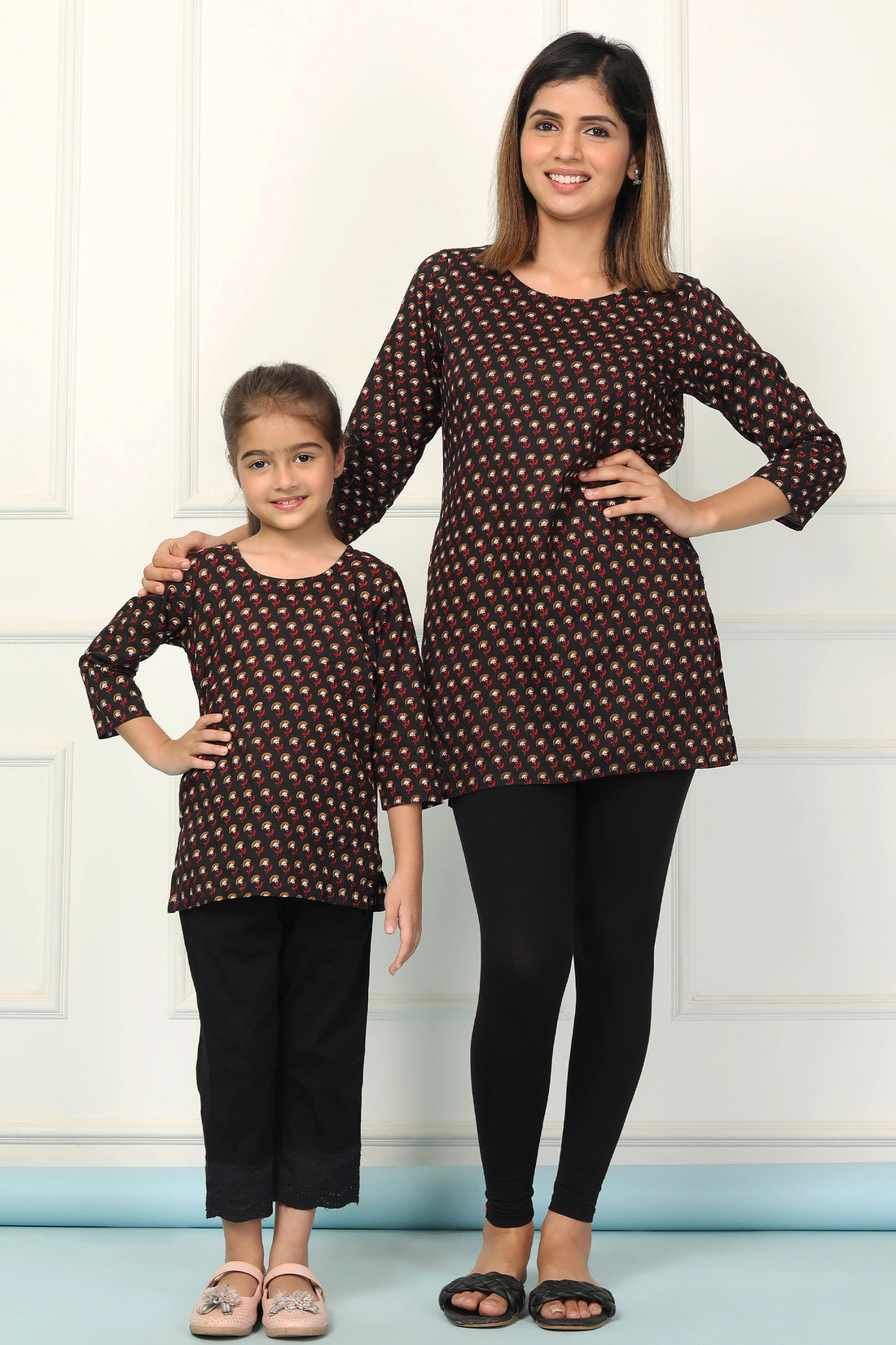 Trendy Matching Black Printed Short Kurtis Set for Mothers and Daughters - Perfect for Stylish Twinning