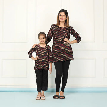 Trendy Matching Black Printed Short Kurtis Set for Mothers and Daughters - Perfect for Stylish Twinning