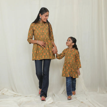 Matching Green and Yellow Printed Tops for Mother and Daughter