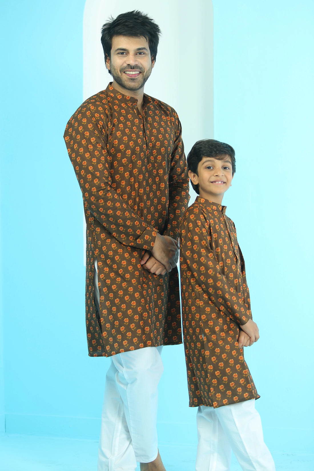 BROWN AND YELLOW FLORAL KURTA WITH WHITE PYJAMA ( FATHER AND SON TWIN SET )