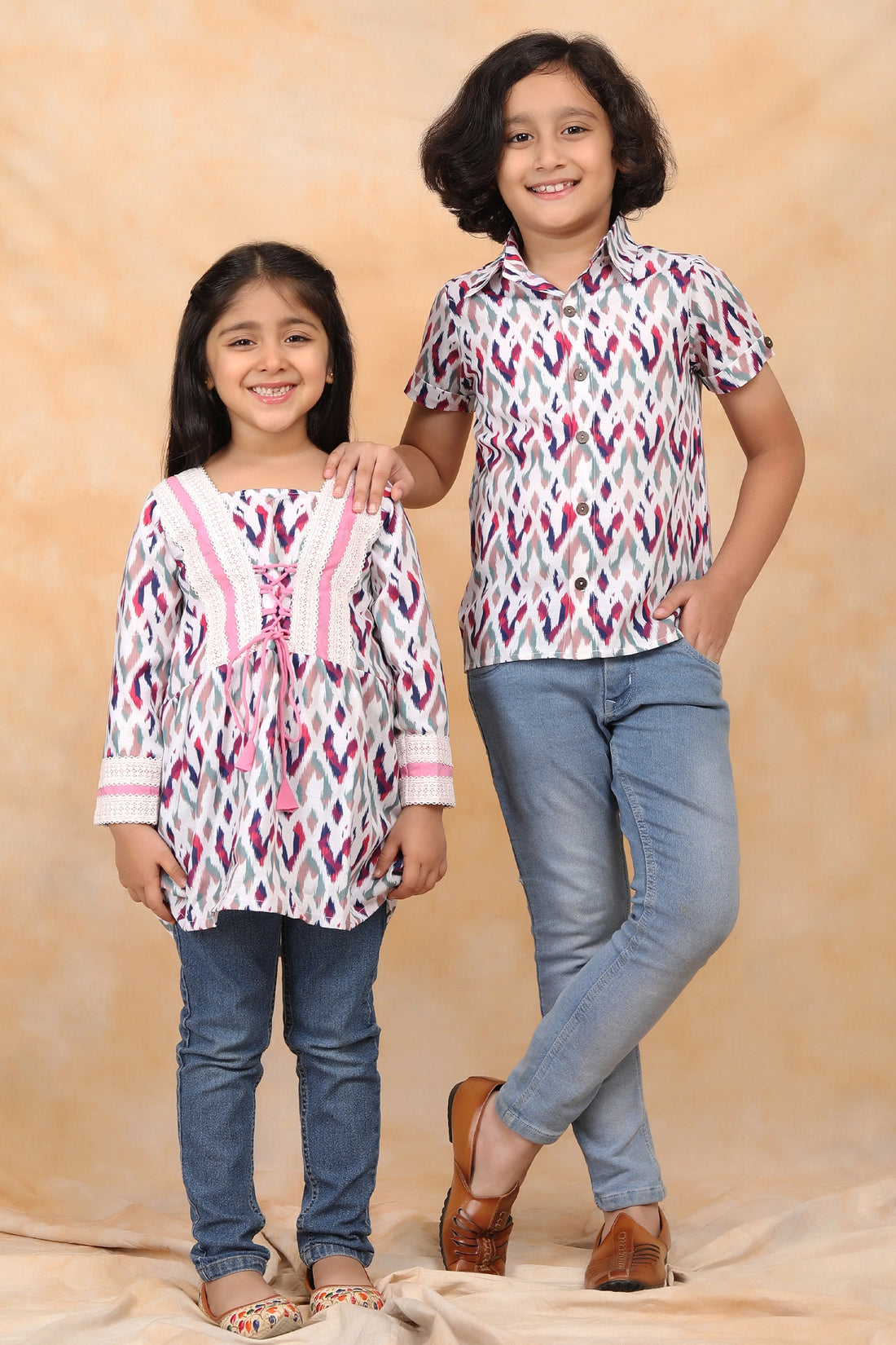 Purple Hues and Coordinated Views: White and Purple Ikkat Twin Set for Brother and Sister